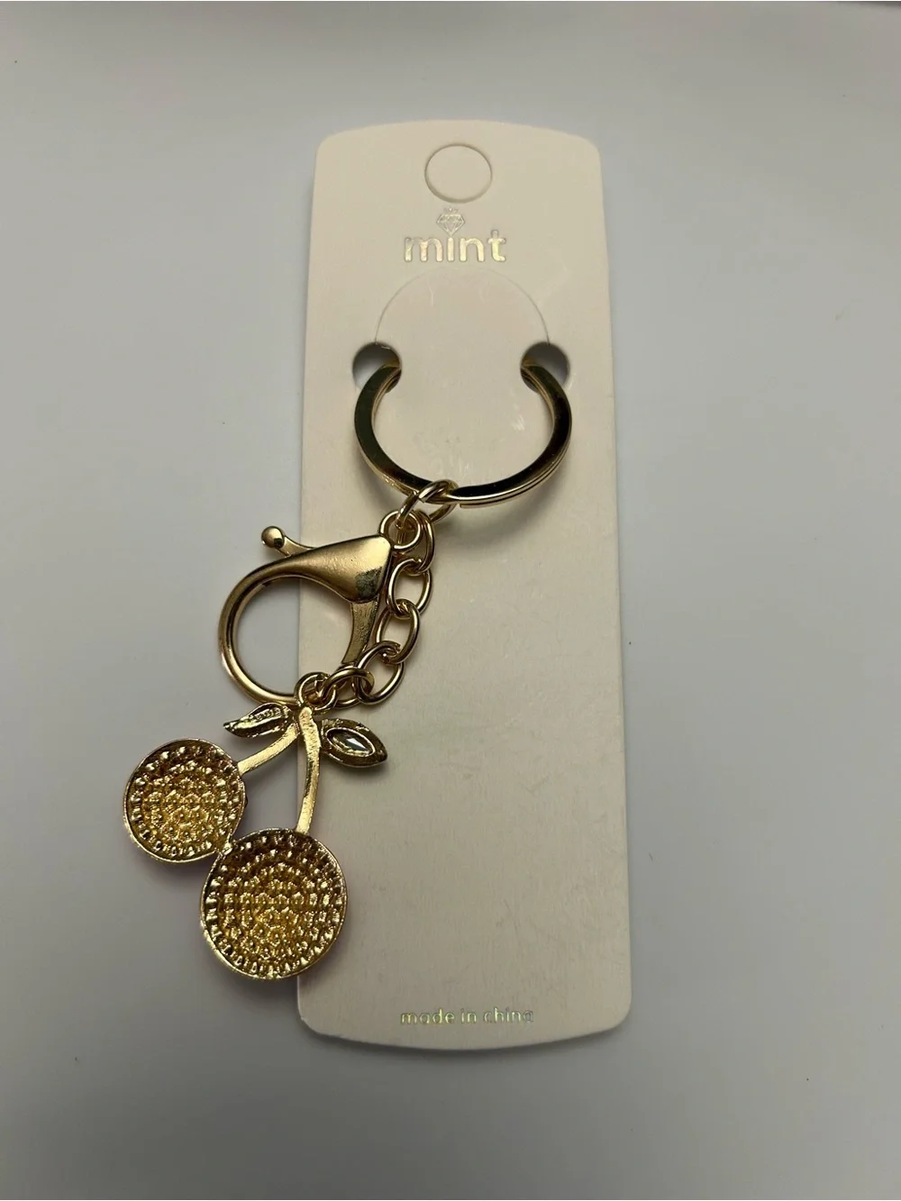 Cherry Keyring with Pink Crystals and Green Leaf